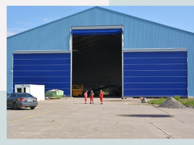 Ангарные ворота в Стрежевой от СтальСтрой-Стж по цене 612 руб.